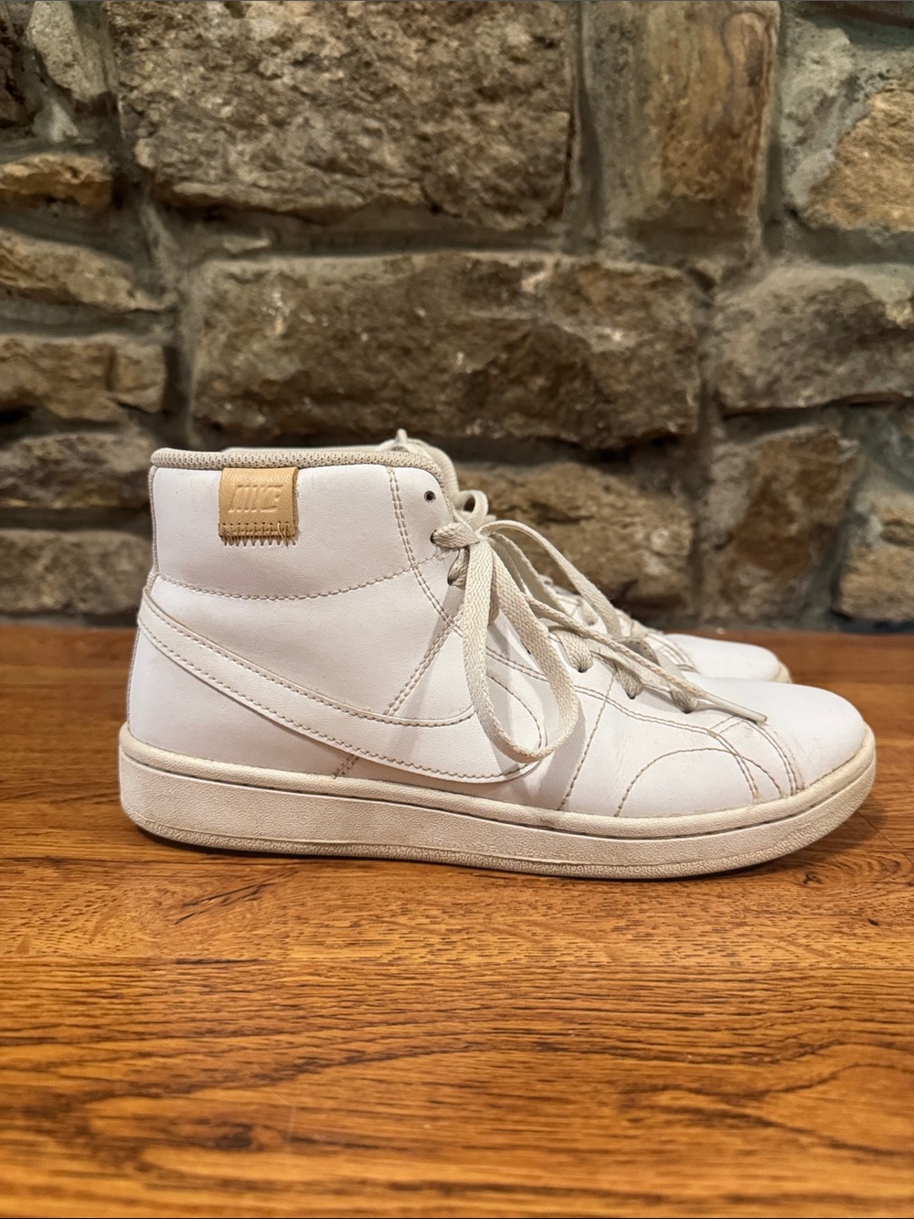Nike White High-Top Sneakers with Tan Patch